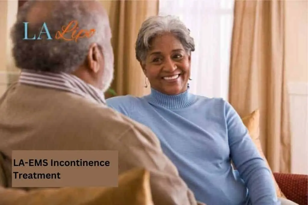 Couple sat smiling at each other - LA-EMS treatment Greater London (Tower Hamlets)