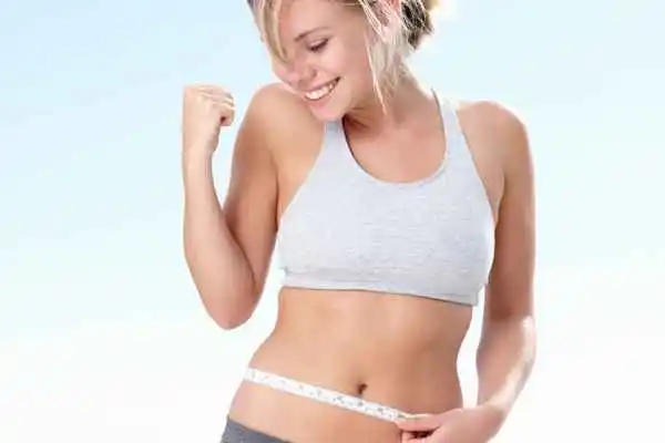 woman happy after fat reduction treatment Greater London (Tower Hamlets)