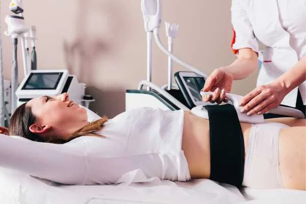 woman having body sculpting to help improve her body image and her mental health Greater London (Tower Hamlets)